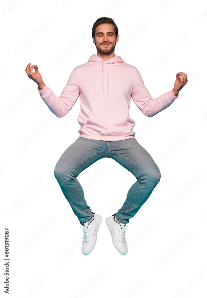 Full length body size photo of focused minded thoughtful man sitting doing yoga while jumping up in blue pants isolated on transparent background Full length body size photo of focused minded thoughtful man sitting doing yoga while jumping up in blue pants isolated on transparent background