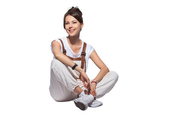 Portrait of a casual happy woman sitting on the floor on transparent background