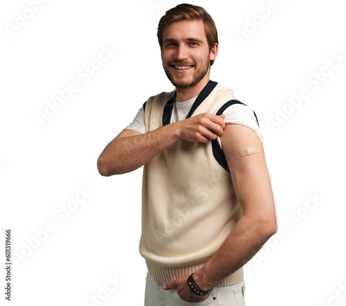 Man smiling after receiving vaccination. Man showing his arm after receiving a vaccine