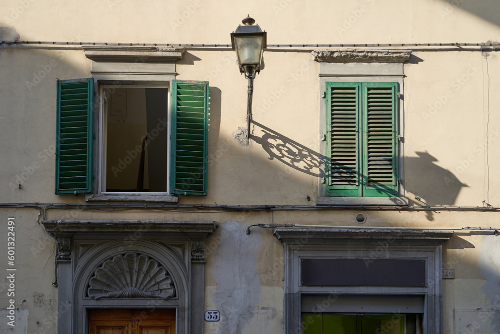 Architecture details of an old house in Florence, Italy