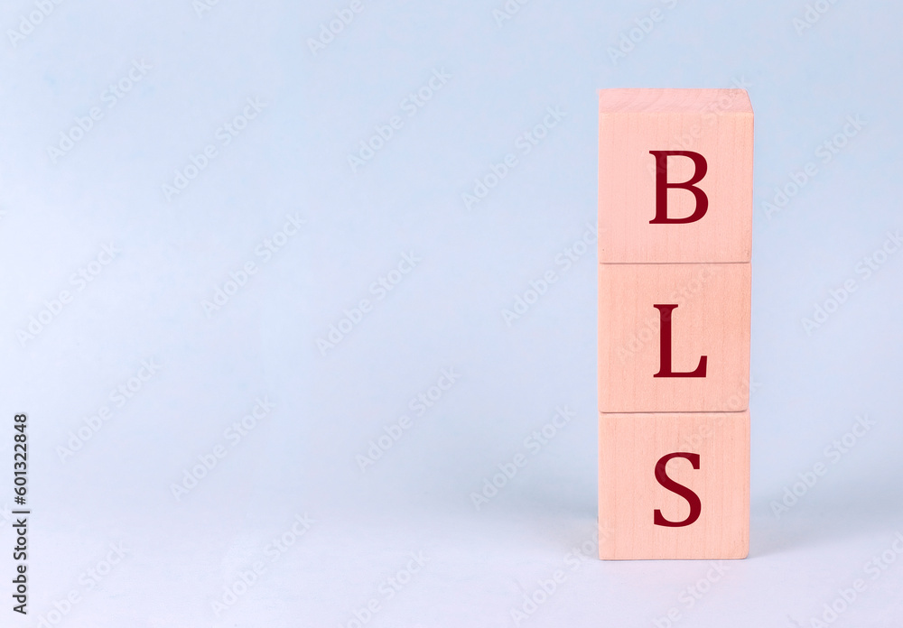 BLS on wooden cubes on a blue background BLS on wooden cubes on a blue background