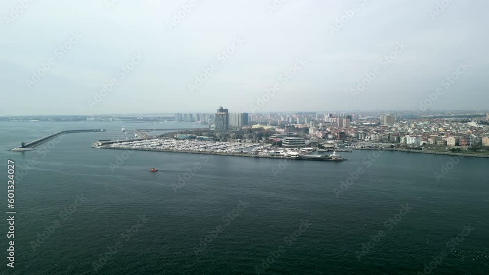 Atakoy Marina and Bakirkoy ferry with Istanbul city in the background fly away Atakoy Marina and Bakirkoy ferry with Istanbul city in the background fly away
