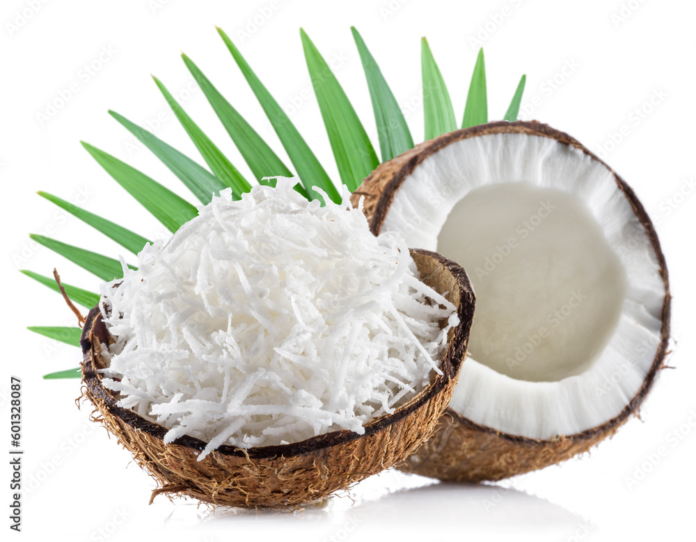 Cracked coconut and shredded coconut meat isolated on white background. Cracked coconut and shredded coconut meat isolated on white background.