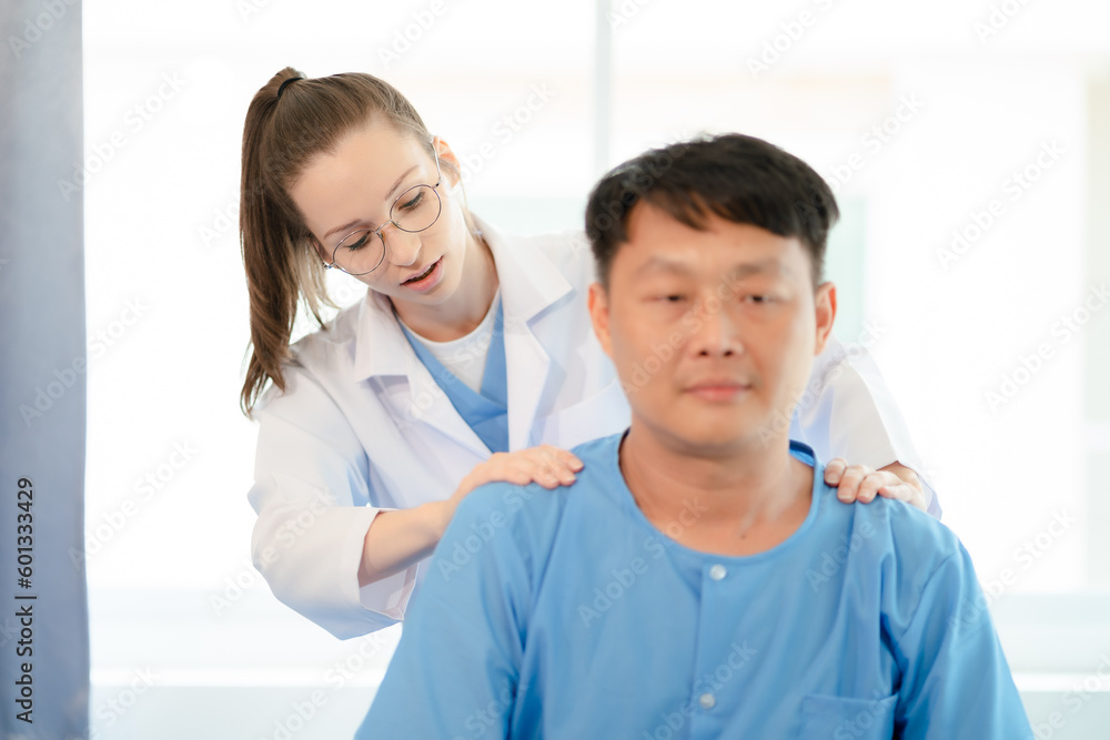 Patient at the physiotherapy doing physical exercises with docter therapist. Patient at the physiotherapy doing physical exercises with docter therapist.