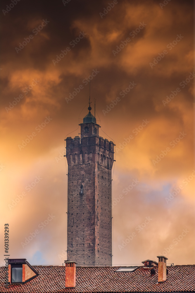 Bologna, Italy Asinelli Tower, part of Due Torri, medieval Two Towers city symbol, against dramatic orange clouds.