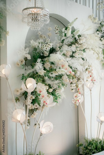 A luxurious and beautiful wedding decoration featuring elegant floral arrangements, intricate detailing, and opulent lighting, creating a stunning ambiance