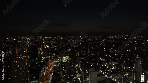 Wallpaper Mural TOKYO, JAPAN : Aerial high angle view of CITYSCAPE of TOKYO at night. View of buildings and street around Shibuya crossing. Japanese urban city life concept 4K video. Torontodigital.ca