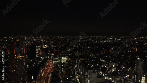 Wallpaper Mural TOKYO, JAPAN : Aerial high angle sunrise CITYSCAPE of TOKYO. View of rising sun and dramatic sky around Shibuya. Japanese urban city life and nature concept video. Time lapse shot, night to morning. Torontodigital.ca