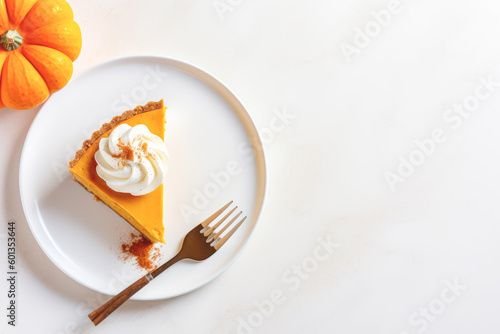 Traditional pumpkin pie topped with whipped cream on white background. Top view  copy space. Generative AI.