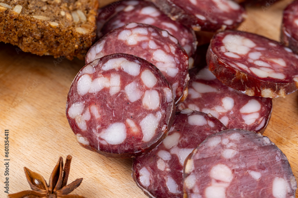 sliced high-quality pork sausage with the addition of lard pieces sliced high-quality pork sausage with the addition of lard pieces