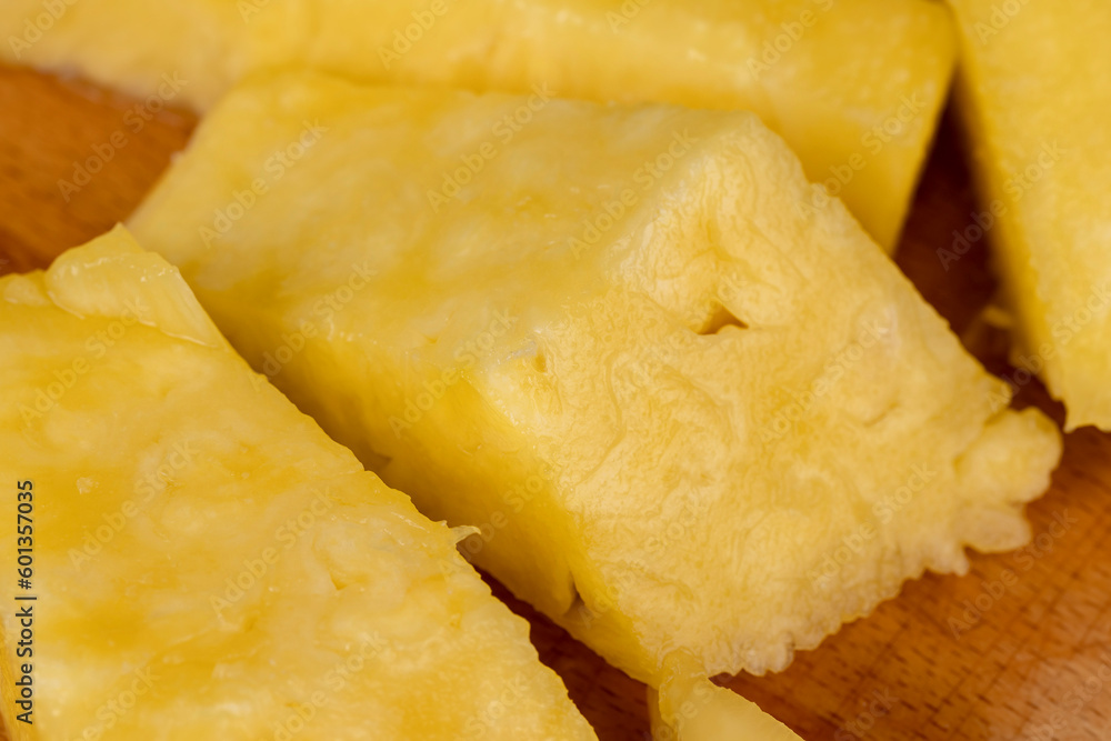 ripe yellow pineapple cut into pieces ripe yellow pineapple cut into pieces