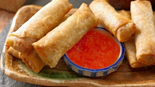Crispy Delights: Mouthwatering Closeup of Egg Roll with Irresistible Sweet and Sour Sauce