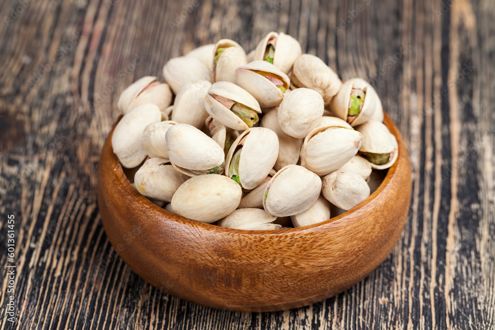 peeled pistachio nuts close-up on the table peeled pistachio nuts close-up on the table