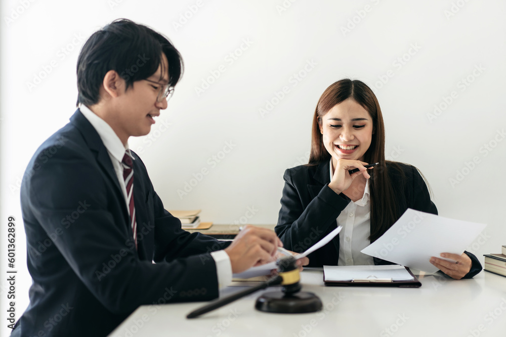 Female lawyer is discussing and legal advice about business cont Female lawyer is discussing and legal advice about business cont