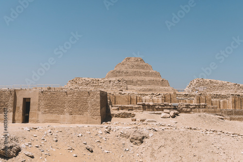 step pyramid at Saqqara is the oldest surviving large stone building in the world. Built by the architect Imhotep in Saqqara for the burial of Pharaoh Djoser circa 2650 BC.