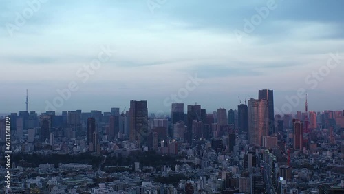 Wallpaper Mural TOKYO, JAPAN : Aerial high angle sunset CITYSCAPE of TOKYO. View of buildings around Roppongi from Shibuya. Time lapse shot, dusk to night. Japanese urban city life and metropolis concept video. Torontodigital.ca