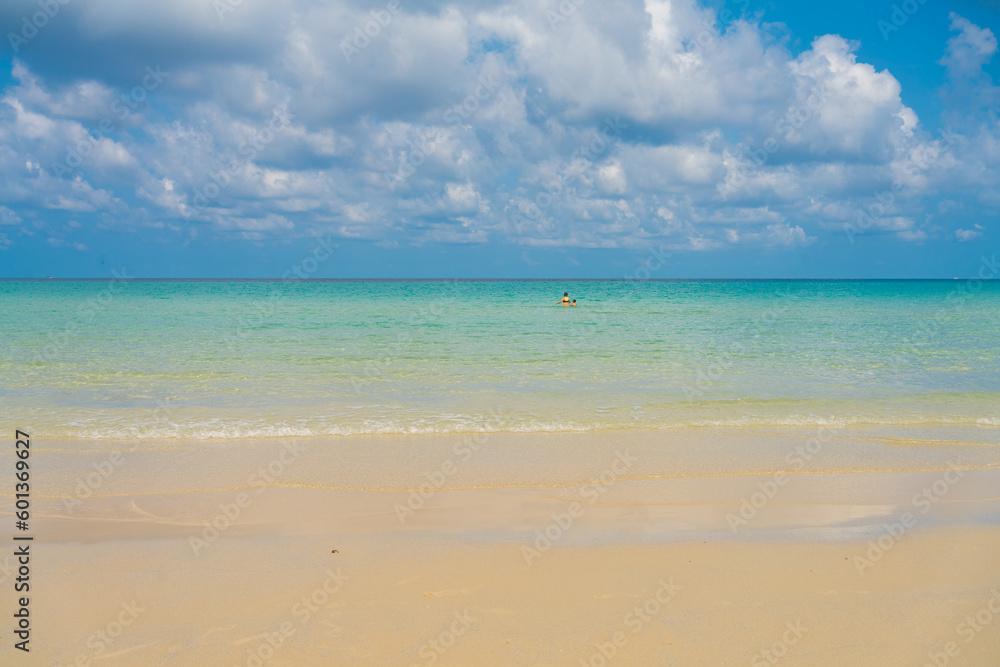 Beautiful sea beach wave white sand blue sky with cloud