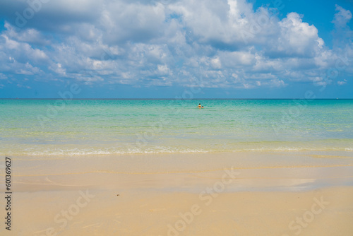 Beautiful sea beach wave white sand blue sky with cloud © themorningglory