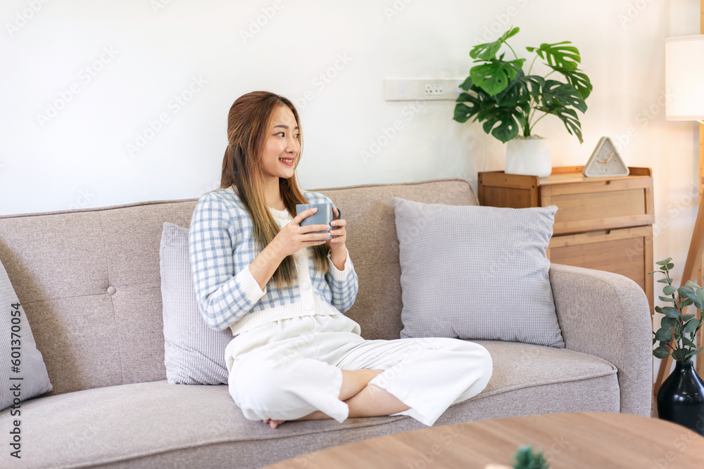 Woman enjoying dreamy and relaxing with drinking hot chocolate w Woman enjoying dreamy and relaxing with drinking hot chocolate w