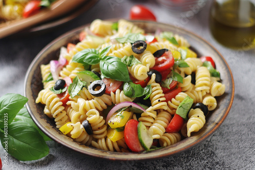 A bowl with traditional Italian pasta salad