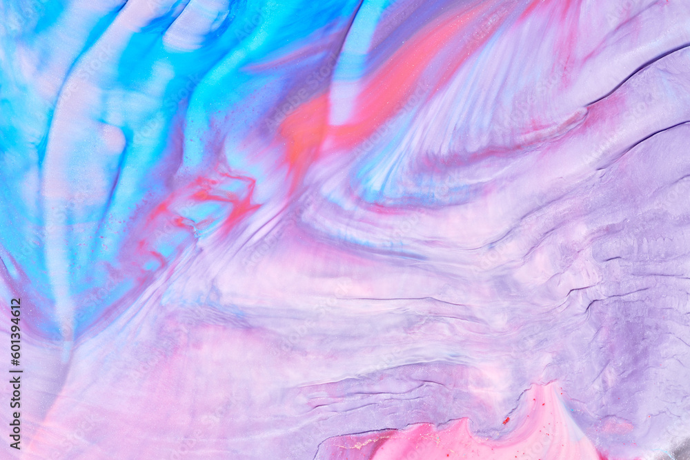 Multicolored creative abstract background. Texture of acrylic paint. Stains and blots of alcohol ink pink blue colors, fluid art.