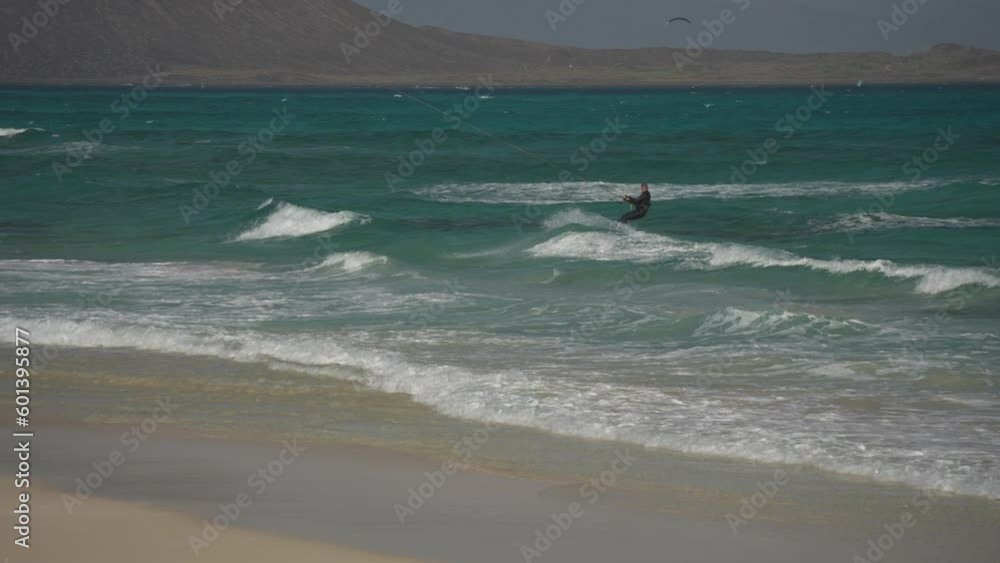 Kitesurfer and Lobos Island in the background, Corralejo National Park, Corralejo Kitesurfer and Lobos Island in the background, Corralejo National Park, Corralejo