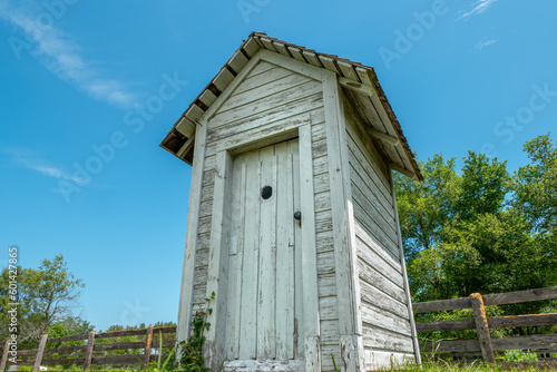Tablou pe pânză Old Wooden Outhouse