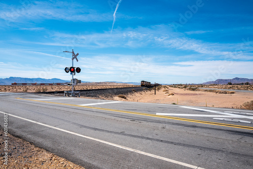 railway crossing and approching train photo