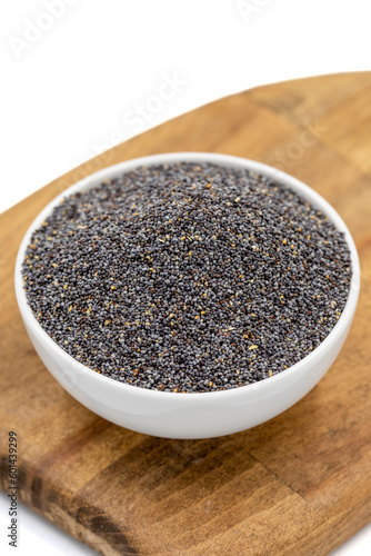 Blue poppy seeds. Spices concept. Blue poppy seeds isolated on white background. Close up