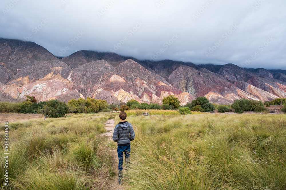 A child looking at the famous painter's palette in the town of Maimara in Northwest Argentina