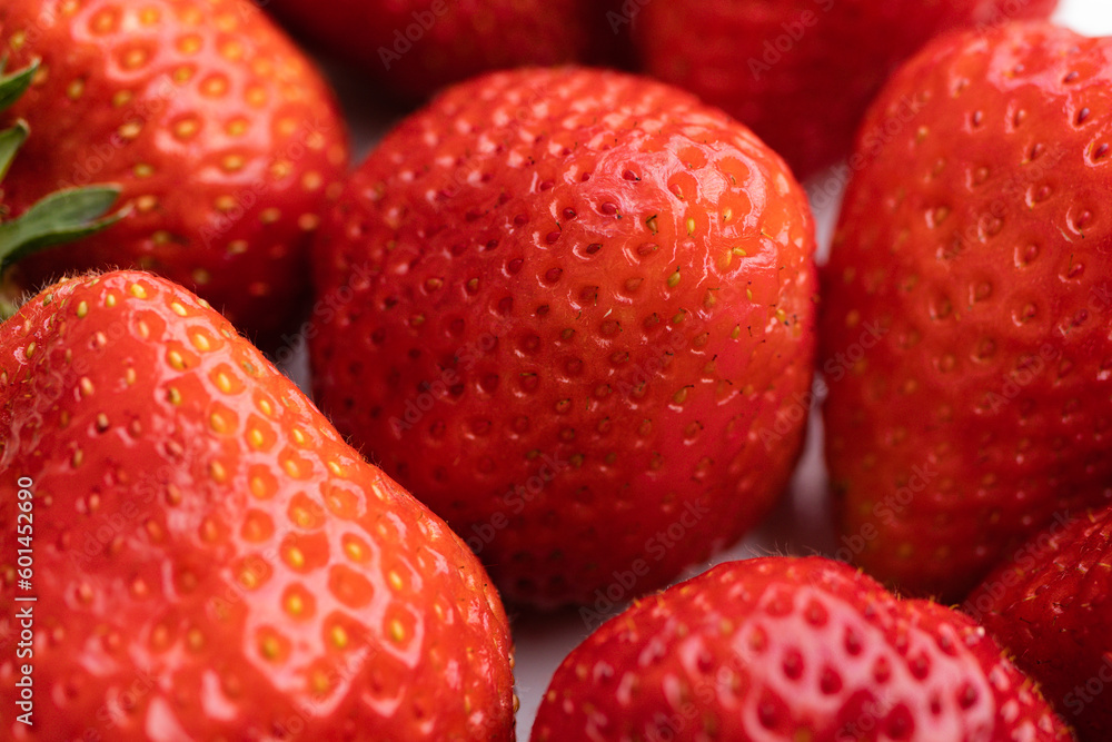 strawberries on a white plate strawberries on a white plate