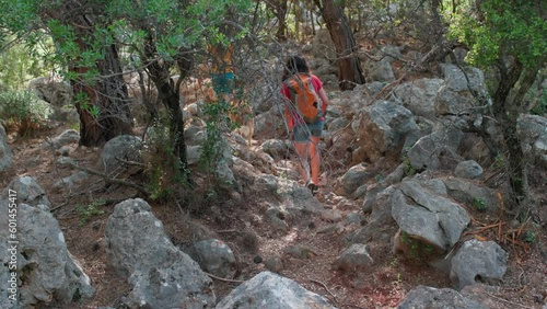 Wallpaper Mural Two women are traveling with a dog, girlfriends are walking along a mountain path with a pet, travel in Turkey Torontodigital.ca