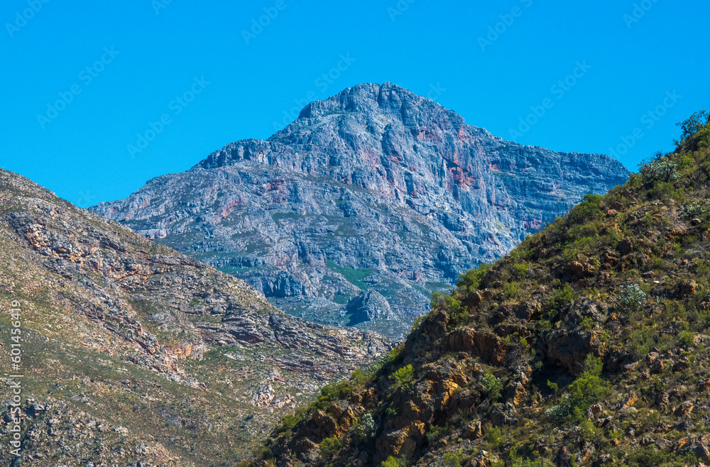 Naklejka premium Seweweekspoort Peak. Nestled in the Klein Swartberg mountain range, Seweweekspoort Peak at 2325m is the highest peak in the Western Cape. The Peak is located in the Seweweeks Poort mountain pass.
