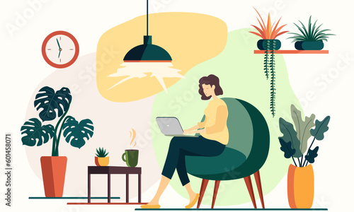 woman is sitting in chair with laptop. Freelancing, online education. Remote work at home.