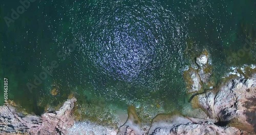 Forward Flight Over Bay from Islands Edge to Glistening Water