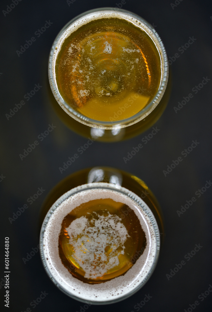 The surface of a glass of beer. Beer foam in a glass. The surface of a glass of beer. Beer foam in a glass.