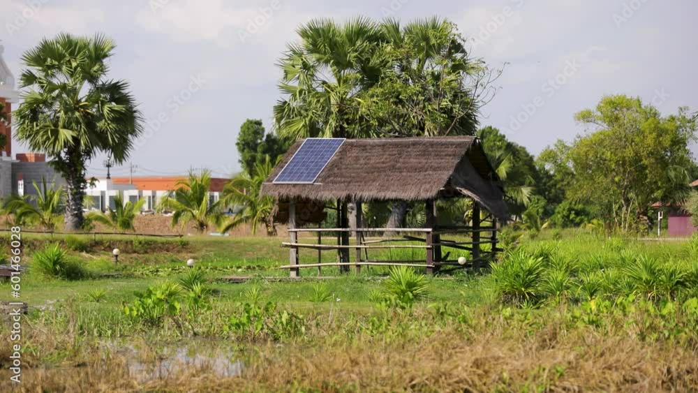 Wooden hut with solar panel on the roof Wooden hut with solar panel on the roof