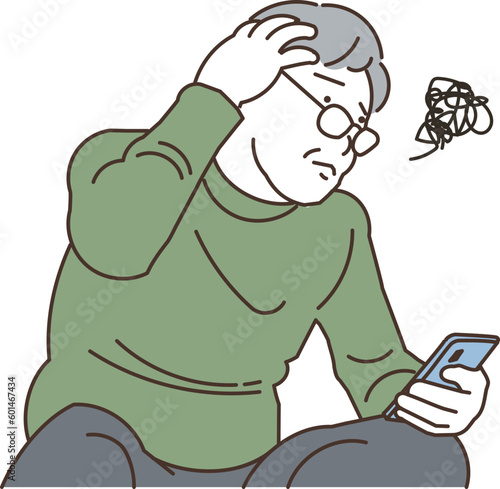 スマホを持ちながら困る高齢者男性