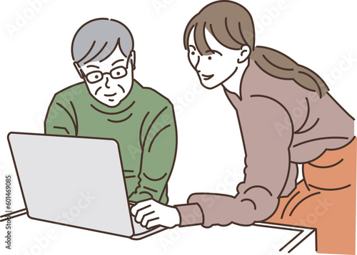 若い女性からパソコンを教わるシニア男性