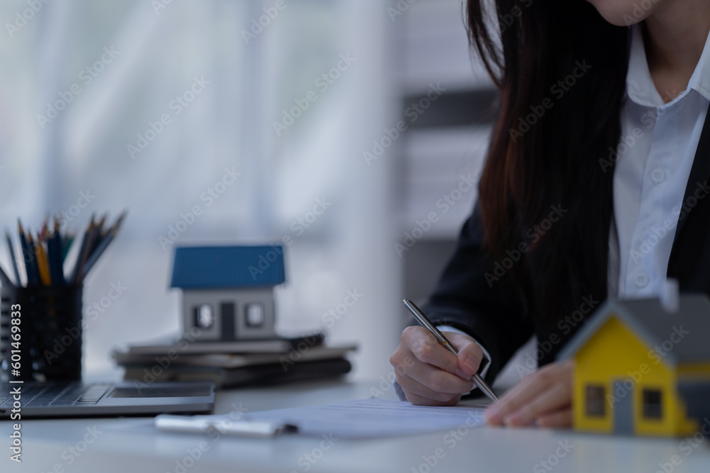 Fototapeta premium Businesswoman discussing commercial real estate sector faces risks as financial