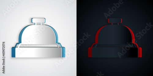 Paper cut Hotel service bell icon isolated on grey and black background. Reception bell. Paper art style. Vector