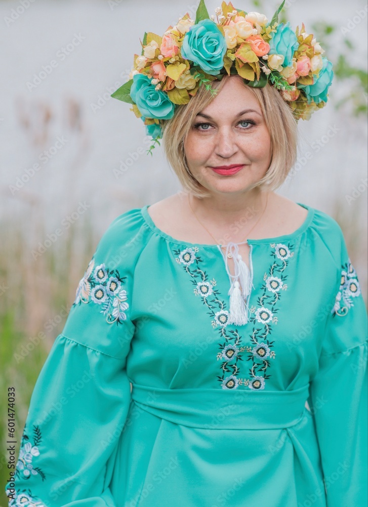 Mature older blonde woman in Ethnic dress. Fashionable details Mature older blonde woman in Ethnic dress. Fashionable details