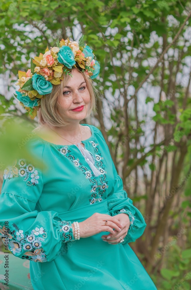 Mature older blonde woman in Ethnic dress. Fashionable details Mature older blonde woman in Ethnic dress. Fashionable details