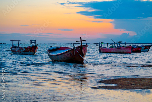 Sunset view with cloudy sky at Gadani Beach with dhow boat
