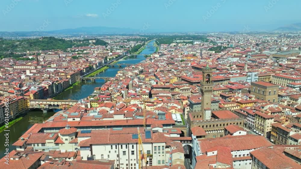 Backwards aerial drone panoramic view of Ponte Vecchio in Florence, Italy in 4K. Beautiful Italian Florence in Tuscany full of culture and historical landmarks seen from above. Backwards aerial drone panoramic view of Ponte Vecchio in Florence, Italy in 4K. Beautiful Italian Florence in Tuscany full of culture and historical landmarks seen from above.
