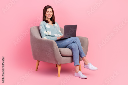 Full body size photo of young future it specialist woman sitting chair learning code python language isolated on pink color background