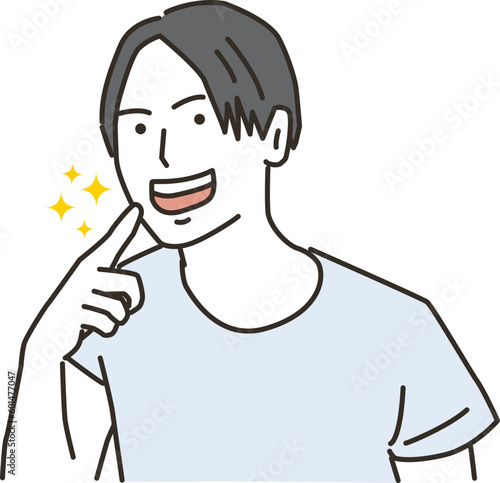 自分の歯（口元）を指差す若い男性
