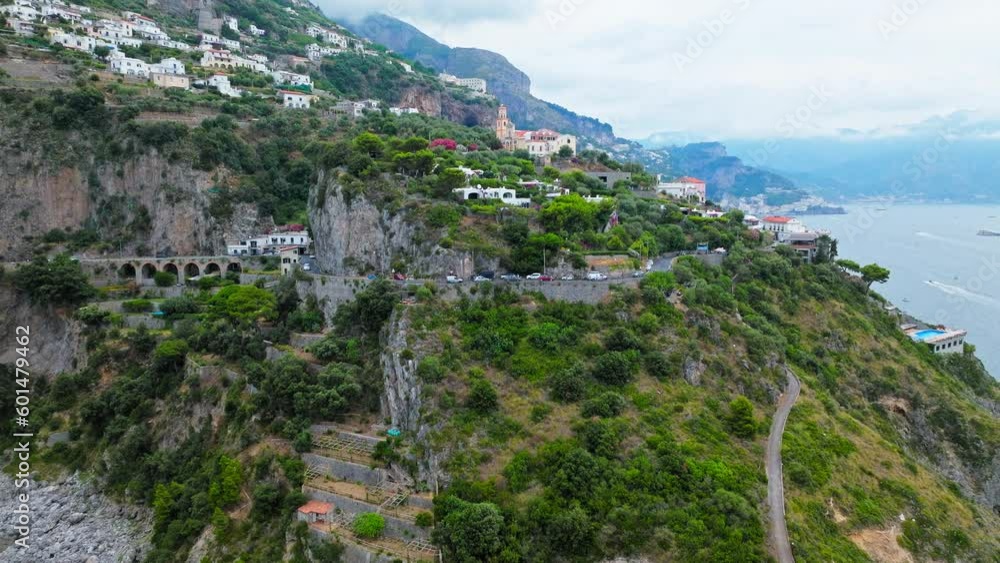 Aerial drone view of Conca dei Marini town on Amalfi Coast in Italy, Europe. Panoramic top view from above of Italian colourful houses, Chiesa San Pancrazio Martire and Torre Capo in ProRes 4K. Aerial drone view of Conca dei Marini town on Amalfi Coast in Italy, Europe. Panoramic top view from above of Italian colourful houses, Chiesa San Pancrazio Martire and Torre Capo in ProRes 4K.