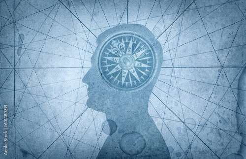 Human head and compass. The concept on the topic of navigation, psychology, morality, etc.