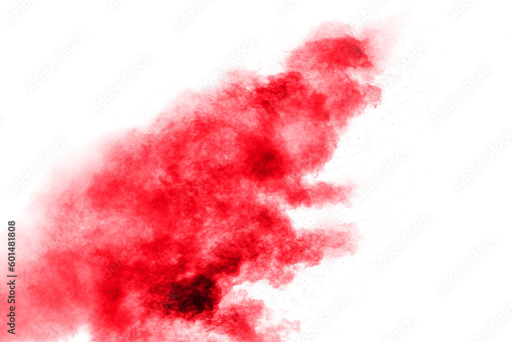 Abstract red dust splattered on white background. Red powder explosion.Freeze motion of red particles splashing.